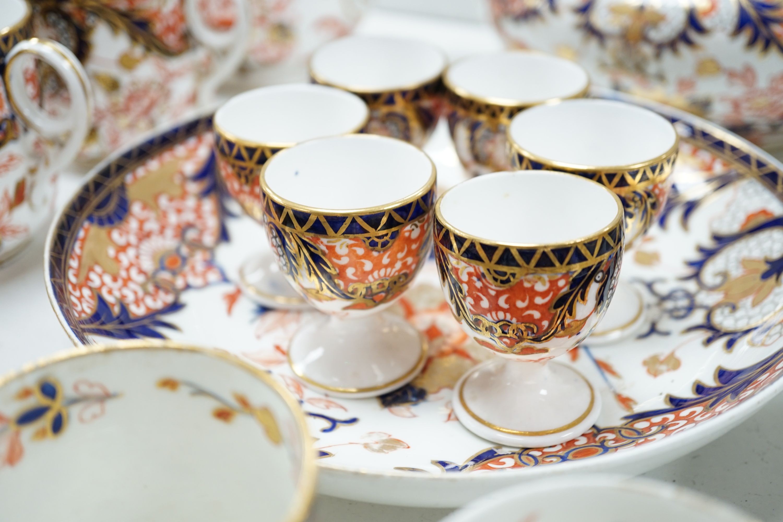 A collection of 19th century Derby Imari pattern tea, coffee and breakfast wares, predominantly pattern number 387